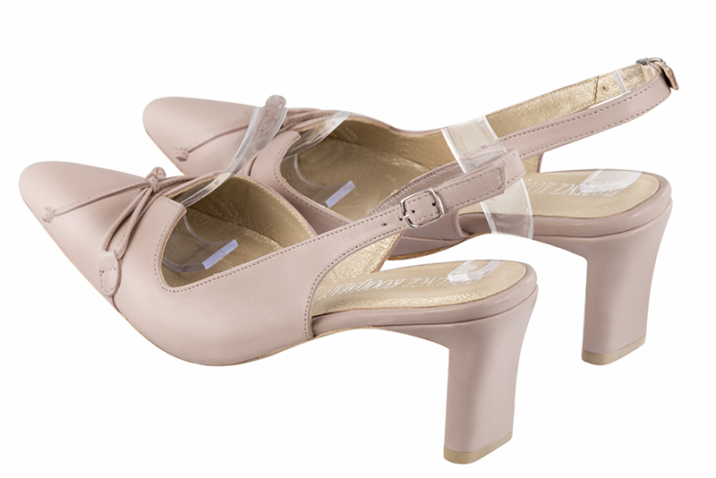 Powder pink women's open back shoes, with a knot. Tapered toe. Medium comma heels. Rear view - Florence KOOIJMAN